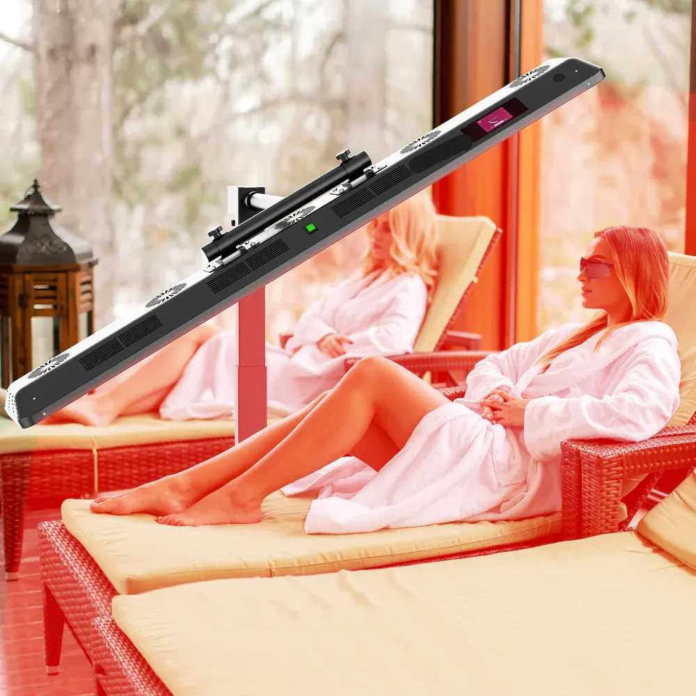 Patient receiving red-light therapy in a modern wellness treatment room